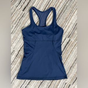 Blue Kyodan XS workout tank with partial mesh back